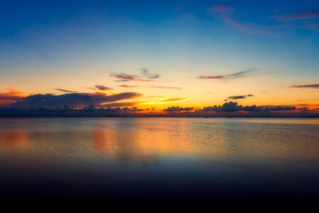 The sky and the lake in the twilight after sunset.