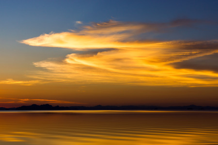 Orange Cloud color after sunset at the lake.の写真素材