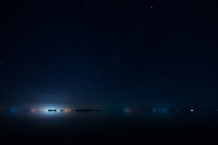 The sky with star at the lake in the dark night.の写真素材