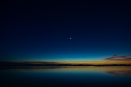 The sky with star at the lake in the twilight after sunset.の写真素材
