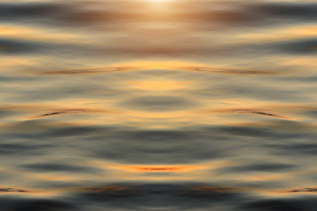 Abstract sunlight on water surface.