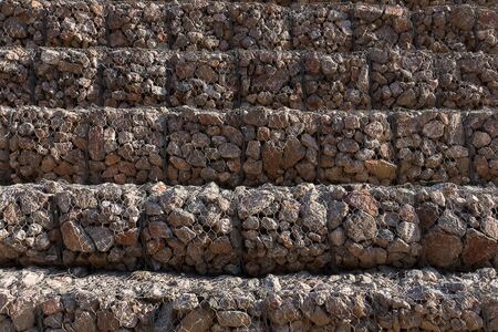 Rock wall protects mountain landslide