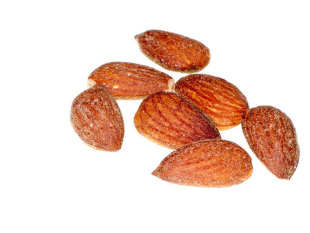 Almonds Salted on white backgroundの写真素材
