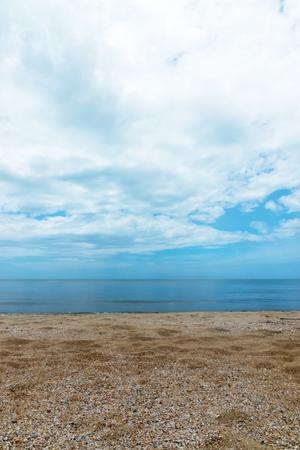 Nobody on the beach with sky and clouds in summer season.の写真素材
