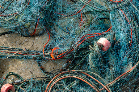 Old fishing net on the beach.の写真素材