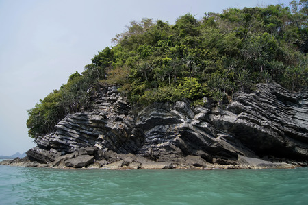 The Pancake rock island in the sea at Khanom province, Nakorn Sri Thammarat, The travel in south of Thailand.の写真素材