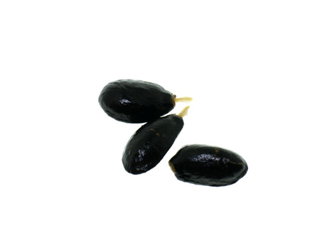 Close up Sugar apple seeds on white background.の写真素材
