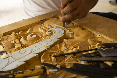 Wood carving in Thailand craftsman.の写真素材