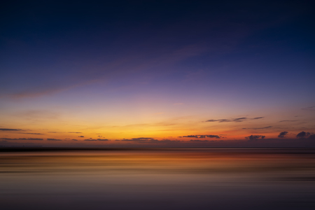 Landscape motion of water at the lake before sunrise with sky background.の写真素材