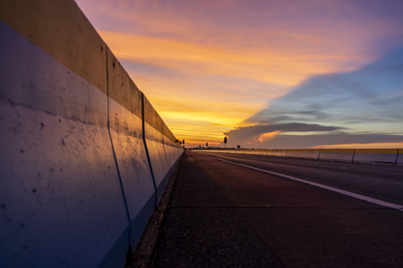 Twilight sky with silhouette of the road after sunset.の写真素材