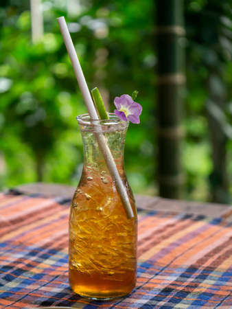 Close up ice tea bottle with blur background.の写真素材