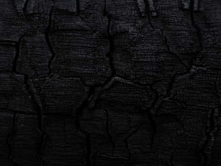 Details on the surface of charcoal. Low key image.の写真素材