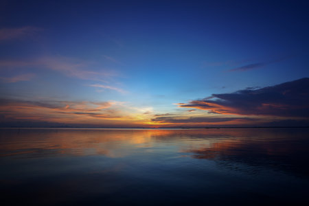 The twilight sky with star after sunset at the lake.の写真素材