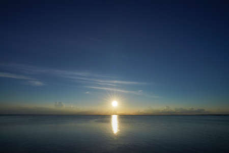 Seascape, The sun on sunset sky at the lake with empty on sky.の写真素材