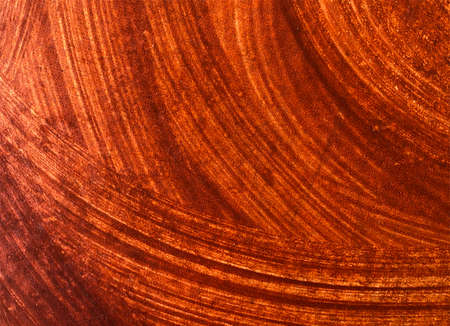 Abstract texture of brown wood with oil pasted as background image.