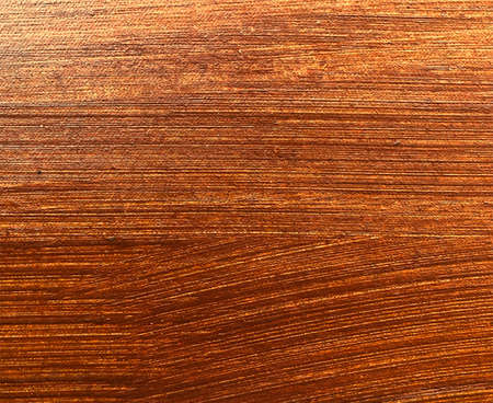 Abstract texture of brown wood with oil pasted as background image.の写真素材