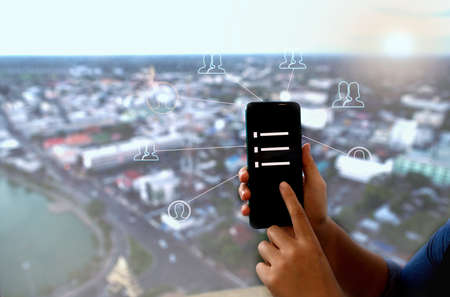 Hands using smartphones to communicate through internet a