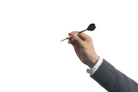 isolated businessman holding darts aiming at the target business goal setting, aiming, focus conceptの写真素材