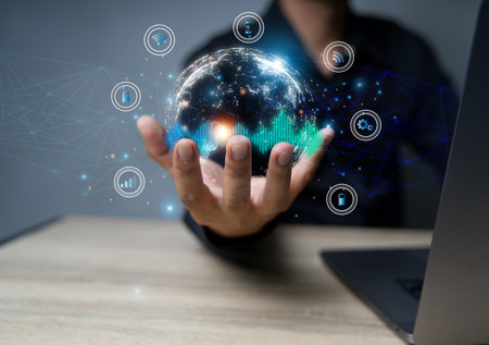 Businessman using laptop computer technology global internet connection for business and finance digital marketing and digital communication technology banking big data and analyticsの写真素材