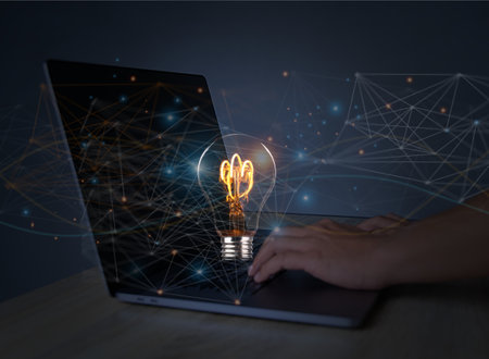 Creative solution or idea for web banner design or landing page template for creative agency with hands coming out of the screen with light bulbs and colorful abstract geometric shapes and lead lines.の写真素材