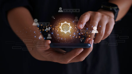 Businessmen using an innovative chatbot in smartphone AI chat GPT chat with AI artificial intelligence developed by OpenAI build futuristic technology robots online. future world innovation conceptの写真素材