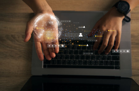 man using a laptop keyboard Top view of businessman using a graphic tablet, chatting concept, communicate globally by surfing the internet, social media world chatting via GPT and AIの写真素材