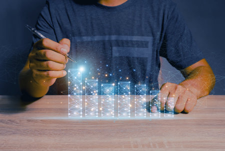 business people reporting chart Analysts work with Business Analytics and tabletop management systems to create reports with KPIs and metrics connected to databases, operations, sales, and marketing.の写真素材