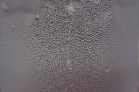 water drop on glass backgroundの写真素材