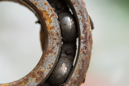 roller bearings. A piece of old engine car spare part. Rusty iron surface. The rust on steel Texture. Decay metal object.の写真素材