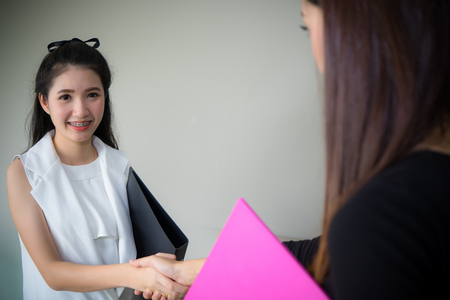Teamwork Deal Cooperation Partnership business people shaking hands after a business meeting in the office.
Sealing a deal. two business women dealing successful. Business Agreement concept.の写真素材