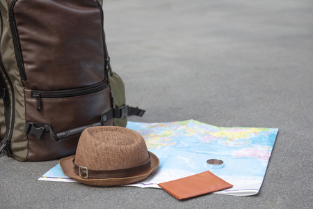 Travel backpack accessories essentials preparation, flat lay, mock up.
Idea for tourism with passport, hat, bag and compass placed on touristic map for traveler. Travel items with copy space on background.
Trip vacation, Time to Travel concept.の写真素材
