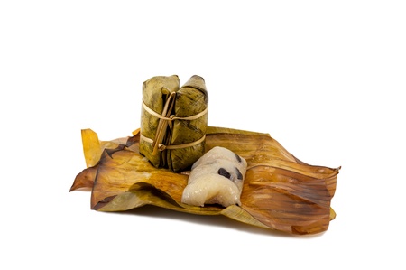 Sticky rice dessert inside bana leaf package