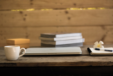 business work on laptop and tea time or coffee timeの写真素材