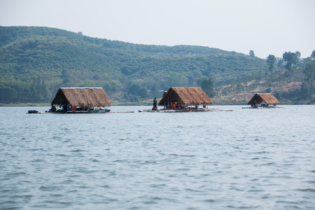 tourism float raft downstream on reservoirの写真素材