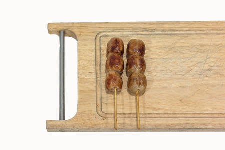 thai sausage on isolated white backgroundの写真素材