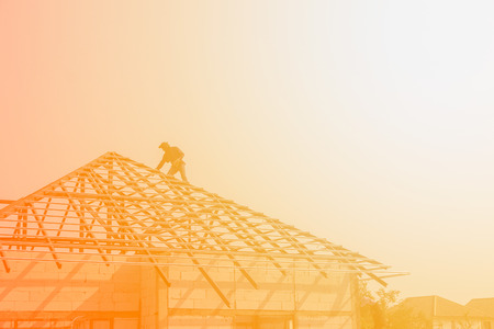 workers make and building the roof on the fair-weatherの写真素材