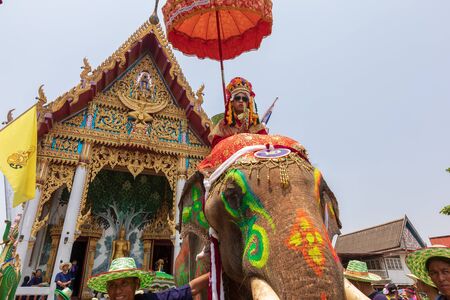 Sri Satchanalai Province,Thailand-April 7,2019 ,Many people celebrate in Thai old culture on Hudson village, Man go into the monkshood on the elephant cross the river more than a 100th year oldのeditorial素材