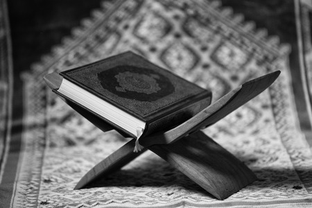 Quran - holy book of Muslims around the world put on wooden boardsの写真素材