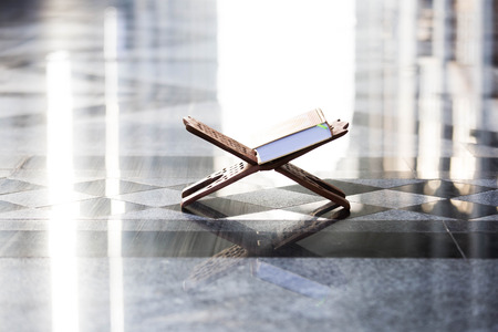 Quran - holy book of Muslims around the world put on wooden boardsの写真素材