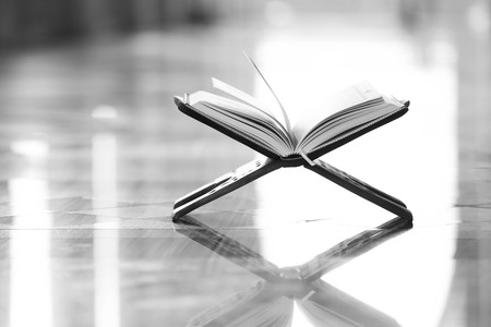 Quran - holy book of Muslims around the world put on wooden boardsの写真素材