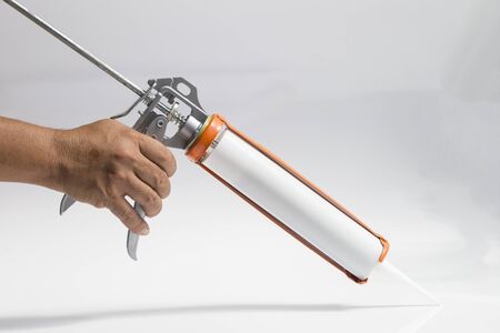 Gun with silicon white backgroundの写真素材