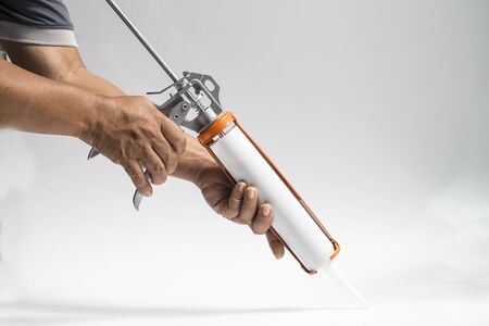 Gun with silicon white backgroundの写真素材