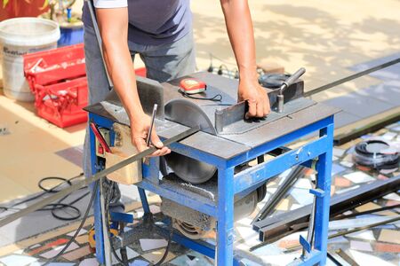 Workers are using aluminum slitting machines and aluminum slitting linesの写真素材