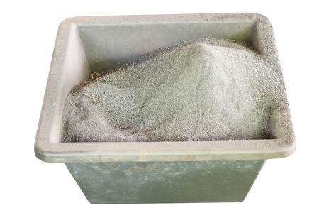 Iron powder in the box in isolate on whiteの写真素材