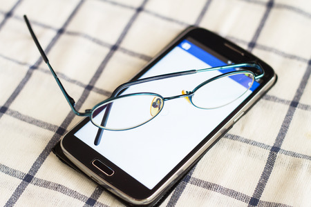 Phone and glasses.の写真素材