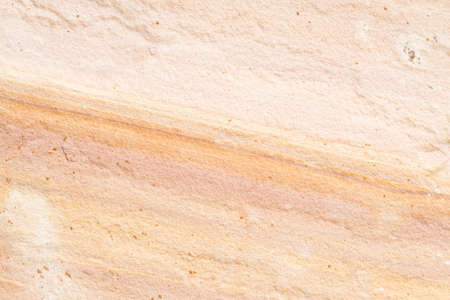 Patterned sandstone texture background (natural color). sandstone in Thailand. For wallpaper or used as a raw material in various designs.の写真素材