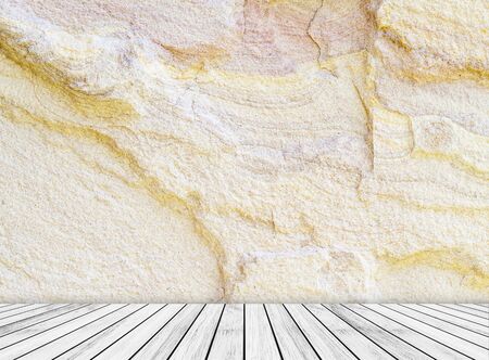 Backdrop  sandstone wall and wood slabs arranged in perspective texture background.の写真素材