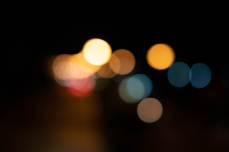 Blurry of bokeh background. Dark space on black.の写真素材
