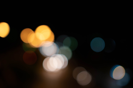 Blurry of bokeh background. Dark space on black.の写真素材