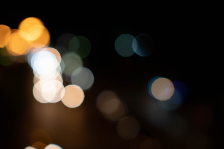 Blurry of bokeh background. Dark space on black.の写真素材